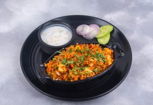Veg Biryani with Raita.
