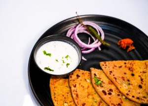 Sattu Paratha with Raita
